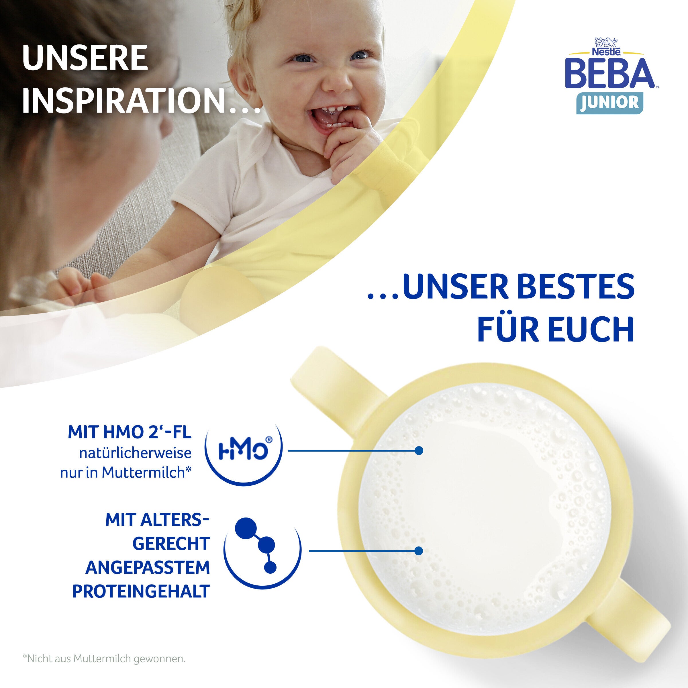 Baby holding bottle of milk with ingredients highlighted.