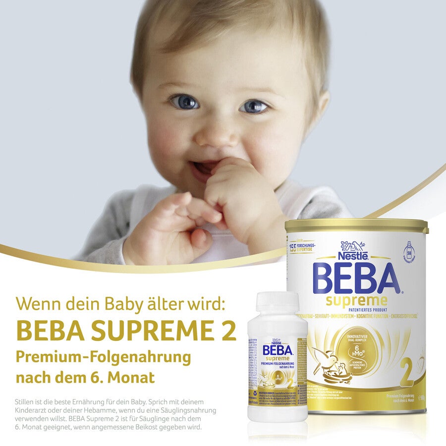 Lächelndes Baby neben einer Dose und Verpackung von BEBA Supreme 2 Säuglingsnahrung