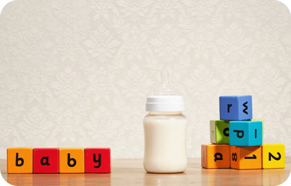 Buchstabenwürfel und Babymilch Buchstabenwürfel und Babymilch