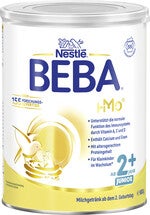 gelbe Metalldose Nestlé BEBA 2+ Milchpulver mit Löffel und Milchgrafik
