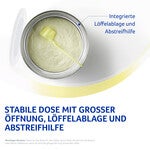 Container of powdered substance with spoon rest and scraper feature.