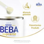 Nestlé BEBA Supreme Produktdose mit Messlöffel und goldenen Icons für klinische Studien/Patente